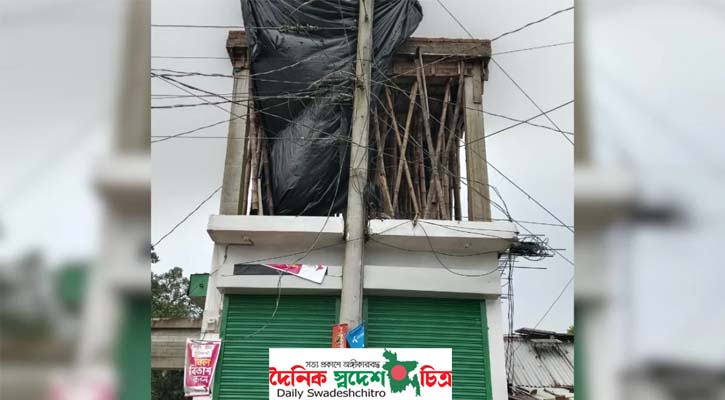 ১১ হাজার ভোল্টের বৈদ্যুতিক খুঁটি রেখেই ভবন নির্মাণ